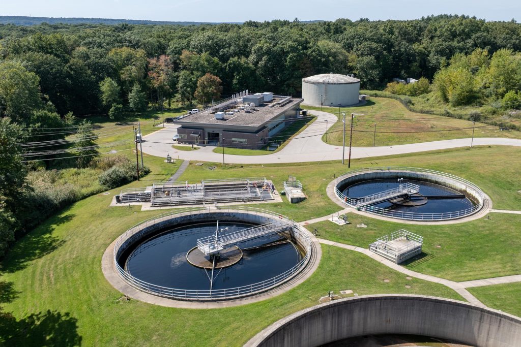 The UConn Water Resource Recovery Facility – where two giant circular tanks of water are depicted, where particles settle out of the water over time.